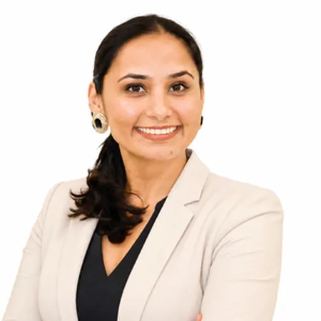 Raj Kiran Kaur | Australian Higher Education Group Raj Kiran Kaur, a professional headshot showing a smiling woman in business attire.