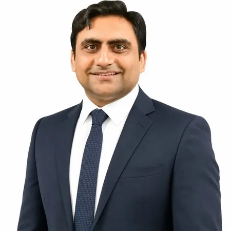 Sukh Sandhu | Australian Higher Education Group Sukh Sandhu, a business professional smiling at the camera.